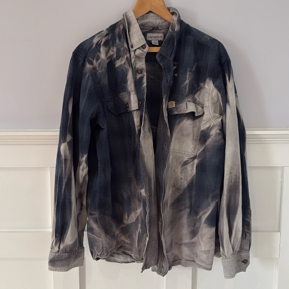 Highly distressed Carhartt shirt